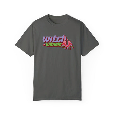 Gray t-shirt with "Witch on Wheels" text in purple and green, featuring a red roller skate graphic. The vintage-style design has a slightly faded look on a relaxed-fit unisex tee.